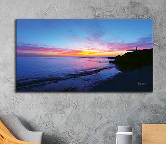 An inspiring sunset at twilight full of vibrant colour and having a serene sense of contentment and wellbeing - create your ideal space with this amazing coastal aerial landscape photo which is available in a selection of canvas sizes.
